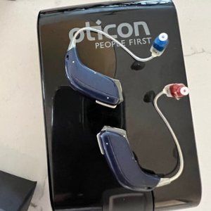 Donna's Opn Receiver in the ear hearing aids